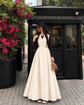 Ivory Elegance – Wrap-Style Flared Maxi Dress