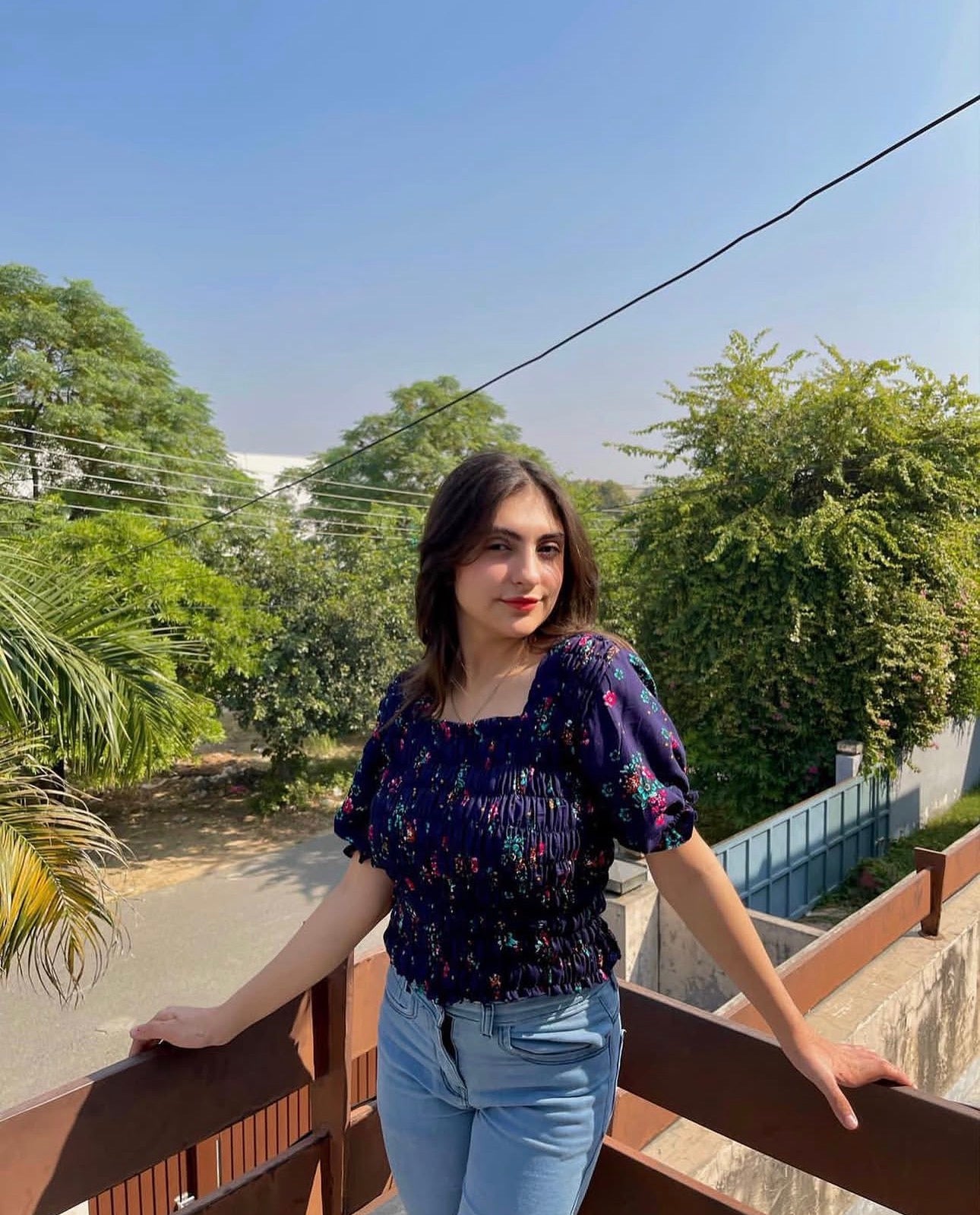 Midnight Bloom Smocked Floral Top – Elegant Casual Chic